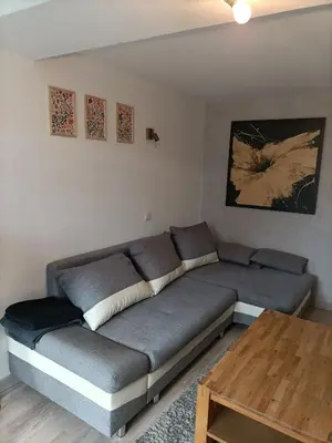 Coin salon dans l'établissement Maison Cozy à Saint Remy proche vélo Francette