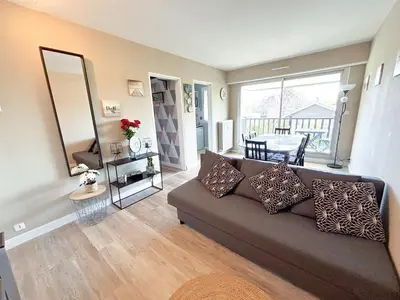 Coin salon dans l'établissement Cabourg bel appartement proche de la plage