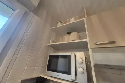 Cuisine ou kitchenette dans l'établissement Gîte OMAHA séjour proche plages Débarquement