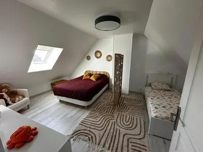Un ou plusieurs lits dans un hébergement de l'établissement Maison au bord du havre et proche mer