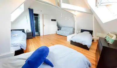 Un ou plusieurs lits dans un hébergement de l'établissement Maison face à la mer avec la Plage à 50 m & Parking privé