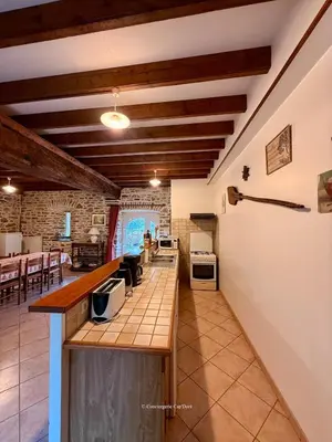Cuisine ou kitchenette dans l'établissement La Bergerie - Le Grand Gîte - Surtainville