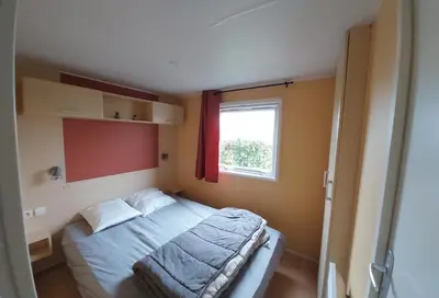 Un ou plusieurs lits dans un hébergement de l'établissement location mobile home proche de la mer
