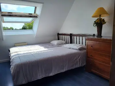 Un ou plusieurs lits dans un hébergement de l'établissement Duplex cosy proche plage avec parking privatif - FR-1-788-100