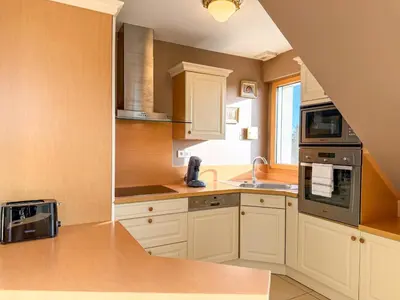 Cuisine ou kitchenette dans l'établissement Le Cap -Vue mer & port - Appartement tout confort