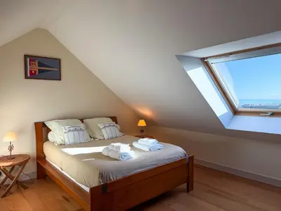 Un ou plusieurs lits dans un hébergement de l'établissement Le Cap -Vue mer & port - Appartement tout confort