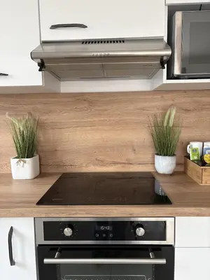 Cuisine ou kitchenette dans l'établissement Les Brises Charming house Port en Bessin