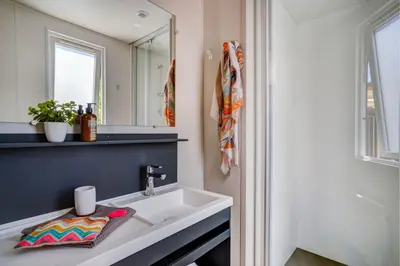Salle de bains dans l'établissement Cottage Friends 10p