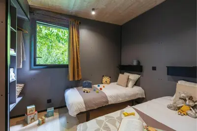 Un ou plusieurs lits dans un hébergement de l'établissement Chalet Albatre 4p 2Bdrms AirCon