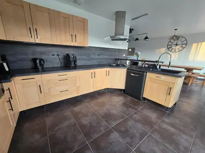Cuisine ou kitchenette dans l'établissement Maison en Normande