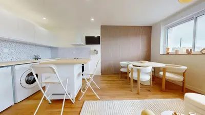Cuisine ou kitchenette dans l'établissement Vue sur le Port de Caen Appartement Premium