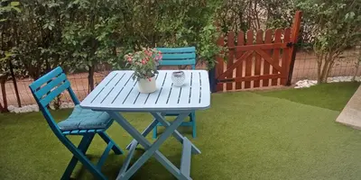Jardin de l'établissement STUDIO COSY avec JARDINET
