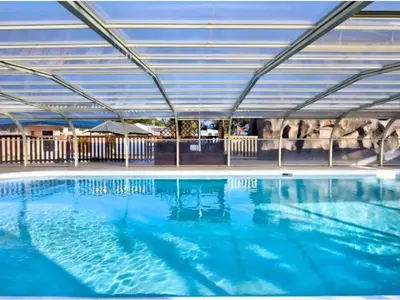 Piscine de l'établissement Mobil-home 4 pers avec terrasse à Sainte-Marie-du-Mont - API-1-52-1297 ou située à proximité