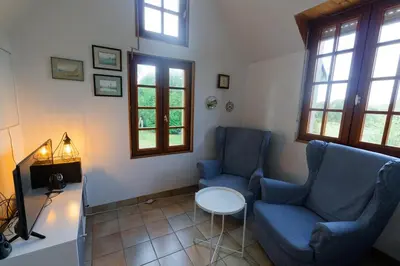 Coin salon dans l'établissement Modernes Landhaus mit großem Garten