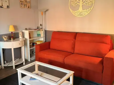 Coin salon dans l'établissement Studio à Cabourg avec accès direct à la plage et parking privatif - FR-1-465-132