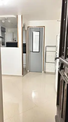 Cuisine ou kitchenette dans l'établissement Studio duplex Meublé
