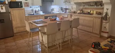 Cuisine ou kitchenette dans l'établissement Au bonheur de Mona