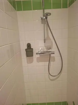 Salle de bains dans l'établissement CHAMBRES D'HOTES à LA FERME DES GOSSELINS