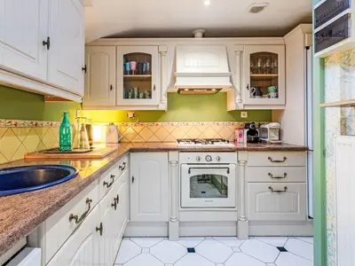 Cuisine ou kitchenette dans l'établissement Holiday Home Girofla by Interhome