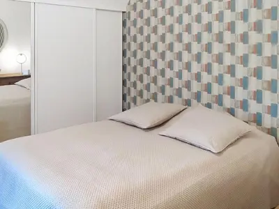 Un ou plusieurs lits dans un hébergement de l'établissement Holiday Home Le Paradis des Fleurs by Interhome