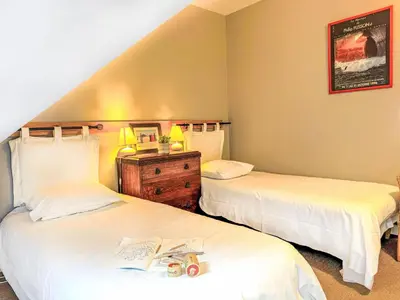 Un ou plusieurs lits dans un hébergement de l'établissement Apartment Gîte Le Bisquin by Interhome