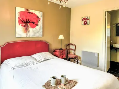 Un ou plusieurs lits dans un hébergement de l'établissement Apartment Gîte Taumain by Interhome