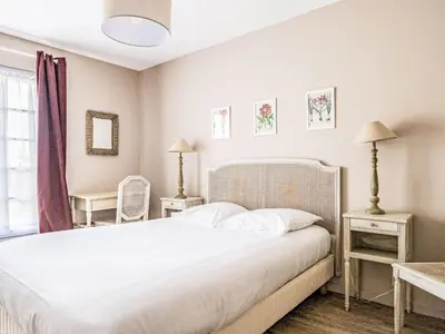 Un ou plusieurs lits dans un hébergement de l'établissement Apartment Gîte Taumain by Interhome