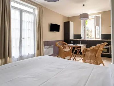 Télévision ou salle de divertissement dans l'établissement Apartment Gite Les Ruets by Interhome