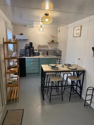 Cuisine ou kitchenette dans l'établissement Le Petit Lodge