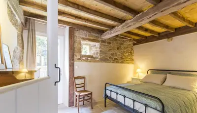 Un ou plusieurs lits dans un hébergement de l'établissement Gîte au calme dans corps de ferme entre mer et campagne