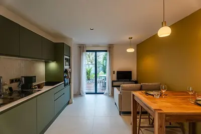 Cuisine ou kitchenette dans l'établissement Bleuet