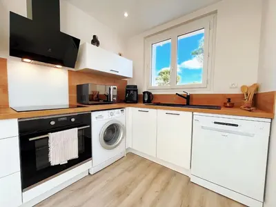 Cuisine ou kitchenette dans l'établissement La brise au pied de la plage