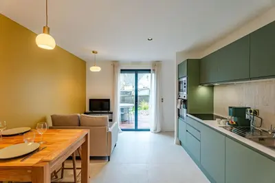 Cuisine ou kitchenette dans l'établissement Coquelicot