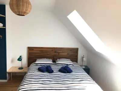 Un ou plusieurs lits dans un hébergement de l'établissement La flibustiere maison de pecheur calme et authentique