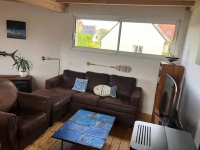 Coin salon dans l'établissement La flibustiere maison de pecheur calme et authentique