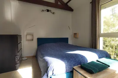 Un ou plusieurs lits dans un hébergement de l'établissement Maison lumineuse avec terrasse et jardin - Caen
