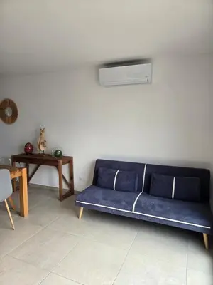 Coin salon dans l'établissement Le repos au bord de l'eau