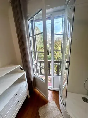 Un ou plusieurs lits dans un hébergement de l'établissement La Toccata maison de charme au coeur de l'éventail de Cabourg