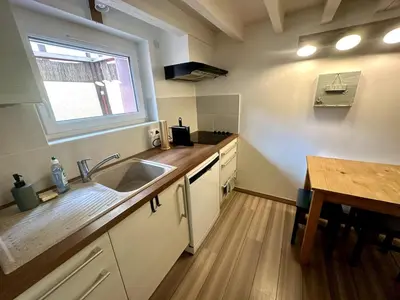 Cuisine ou kitchenette dans l'établissement La Toccata maison de charme au coeur de l'éventail de Cabourg