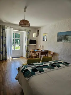 Un ou plusieurs lits dans un hébergement de l'établissement Chambre d'hôtes La Meauffre à la porte de Granville