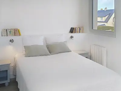 Un ou plusieurs lits dans un hébergement de l'établissement Holiday Home Mahionias's cottage by Interhome