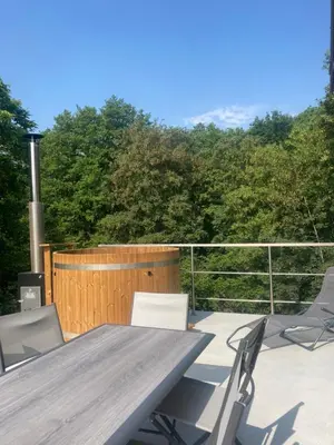 Balcon ou terrasse dans l'établissement Gîte Les Douets