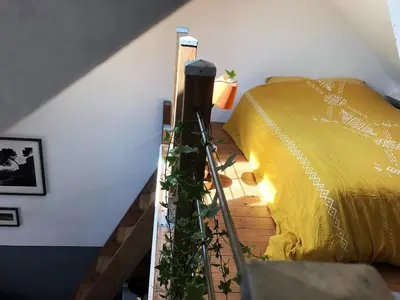 Un ou plusieurs lits dans un hébergement de l'établissement Maison de ville à Luc sur Mer