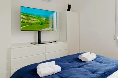 Un ou plusieurs lits dans un hébergement de l'établissement Appartement EMBRUN -Résidence la Dune Blanche -Accès piscine