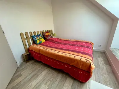 Un ou plusieurs lits dans un hébergement de l'établissement L'Erable - Maison vue mer