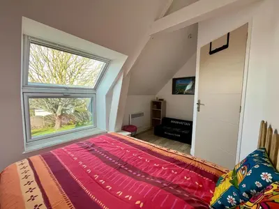 Télévision ou salle de divertissement dans l'établissement L'Erable - Maison vue mer