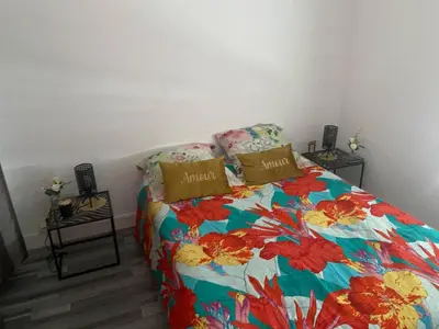 Un ou plusieurs lits dans un hébergement de l'établissement Maison de ville mitoyenne 4 chambres