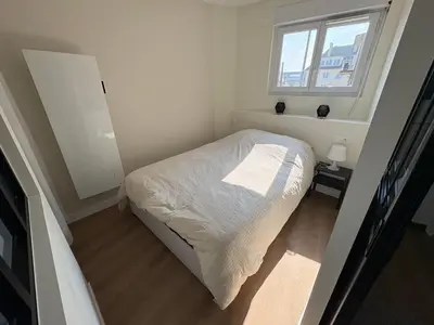 Un ou plusieurs lits dans un hébergement de l'établissement Appartement vue mer