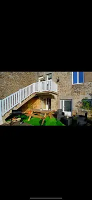 Jardin de l'établissement Charmante maison en granit