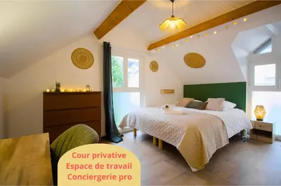 Un ou plusieurs lits dans un hébergement de l'établissement Le Bohème, Maisonnette en duplex avec cour privée, Intendance Luxury Host